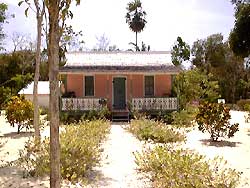 little house on white sand